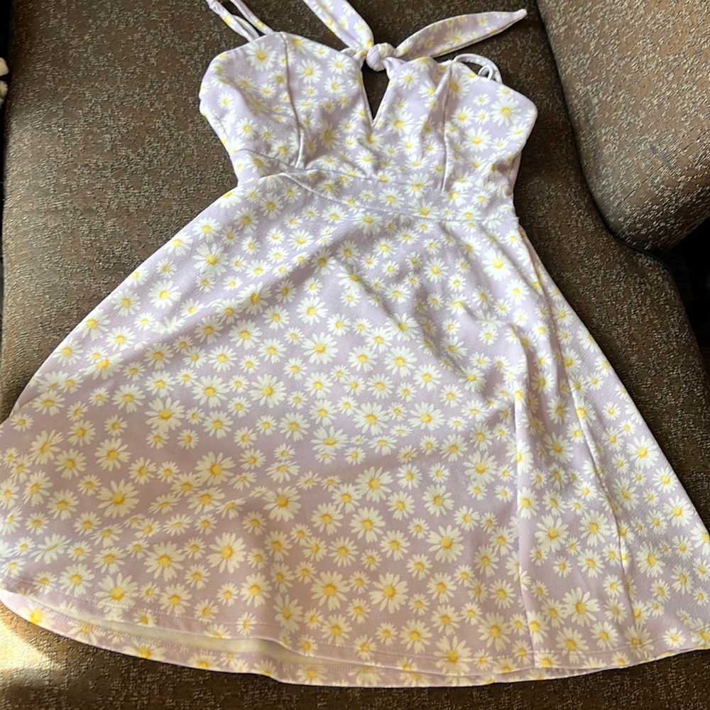 Purple fit n flare dress with an adjustable straps set and back tie.
